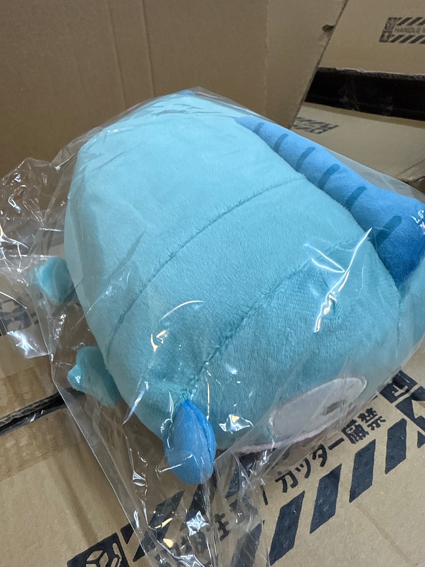 62288 Sanrio Hangyodon laying plushy